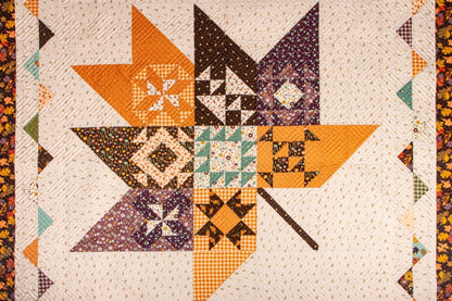 The Awe of Autumn Pressed Leaves Quilt Kit includes pattern, top and binding. Backing not included. KT - 16190 - Ray of Sonshine Design