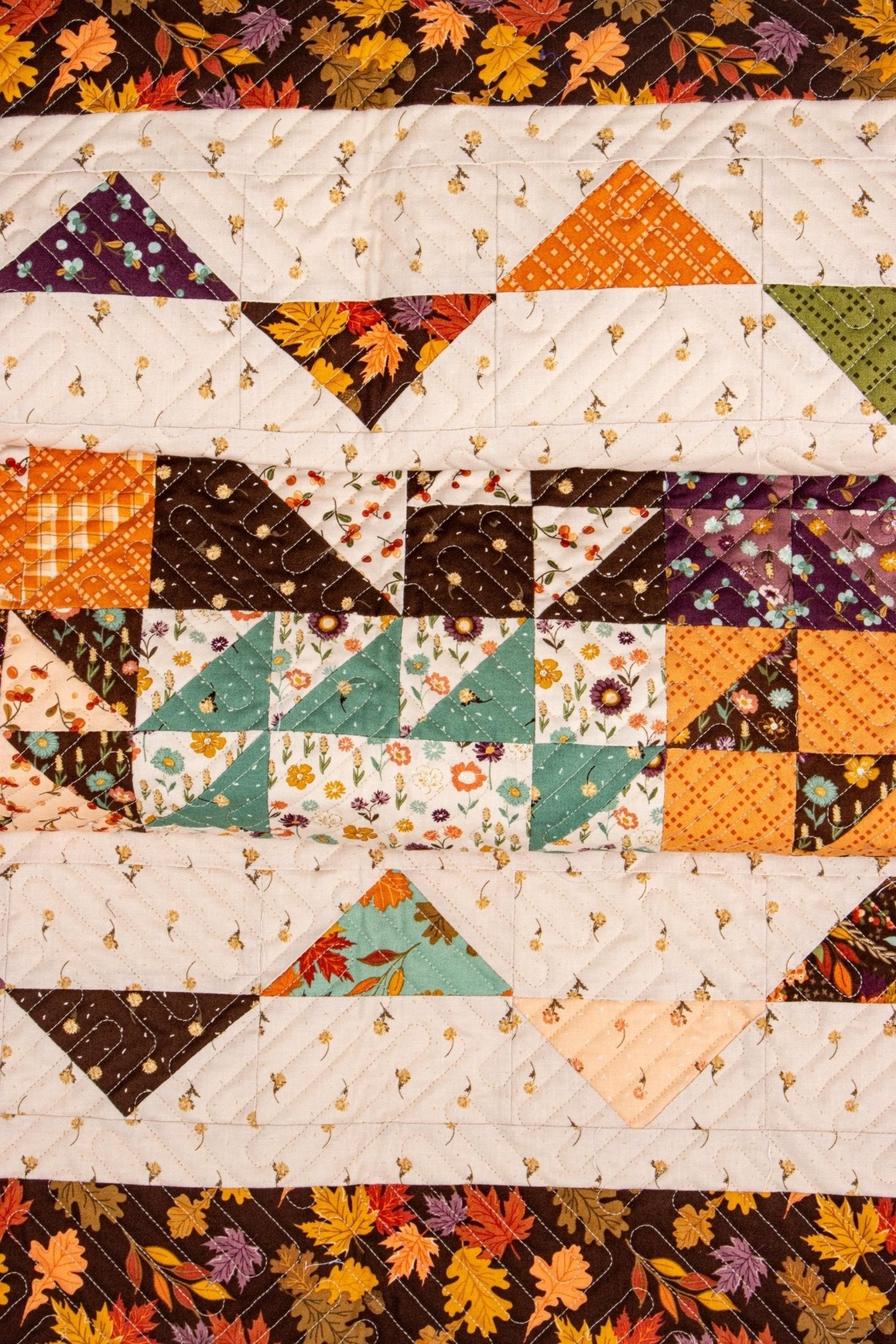 The Awe of Autumn Pressed Leaves Quilt Kit includes pattern, top and binding. Backing not included. KT - 16190 - Ray of Sonshine Design
